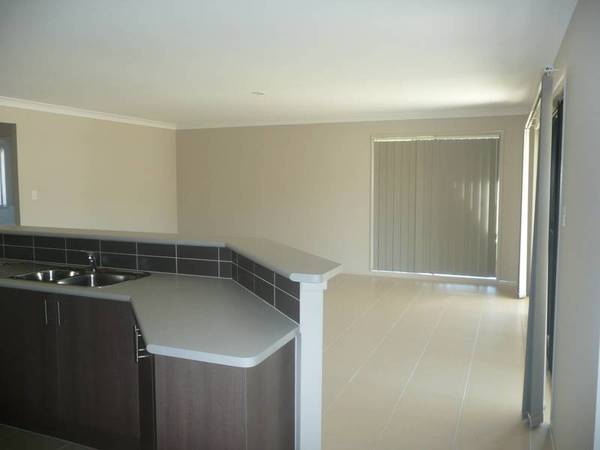 OH SO LOVELY WITH A GREAT SIZE YARD Picture 3