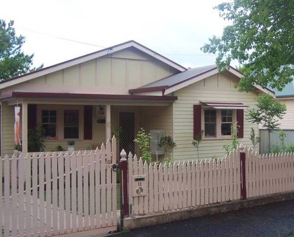 Perfectly Positioned, Walk to everything, A fantastic home, Small from the Street But Large inside Picture 1
