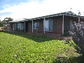 Beautiful Brick Home on Edge of Town Acreage Picture