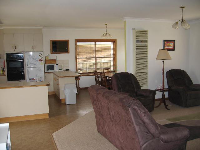 NEAT BRICK HOME & SURROUNDS Picture 2