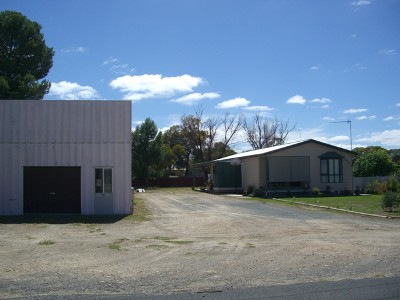 Modern Spacious 4 Bedroom Home with Large Shed Picture
