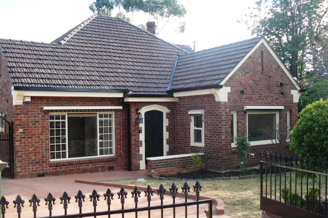 SOLID BRICK TUDOR HOME Picture