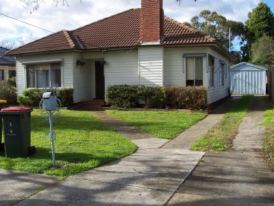 WELL PRESENTED WEATHERBOARD HOME Picture