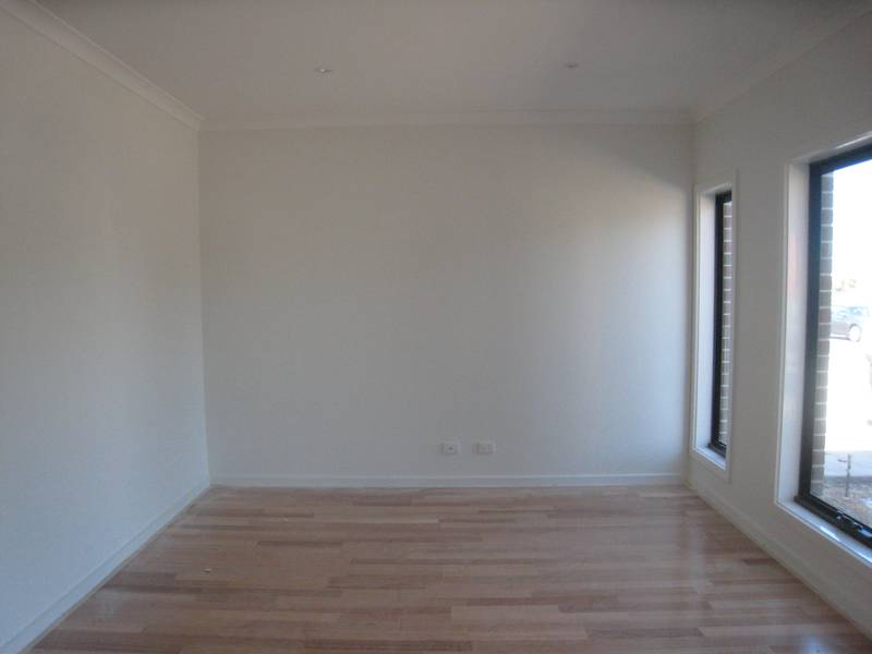 New, Spacious & Central! Picture 3