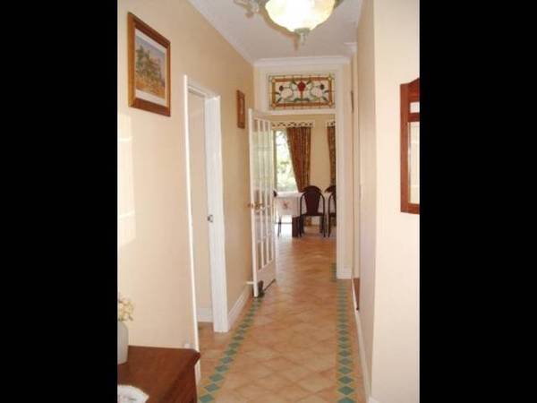 Idyllic Seaside Living Minutes Stroll to Beach with Ocean Views Picture 2