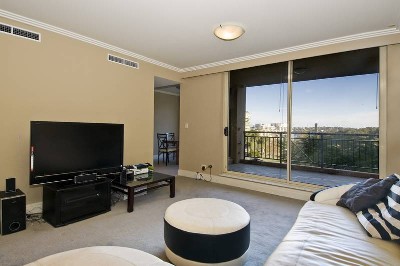 DOUBLE SECURITY PARKING WITH HARBOUR & PARKLAND VIEWS! Picture