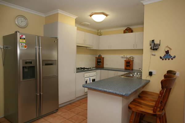 BEHIND A PICKET FENCE - THE AFFORDABLE DREAM Picture