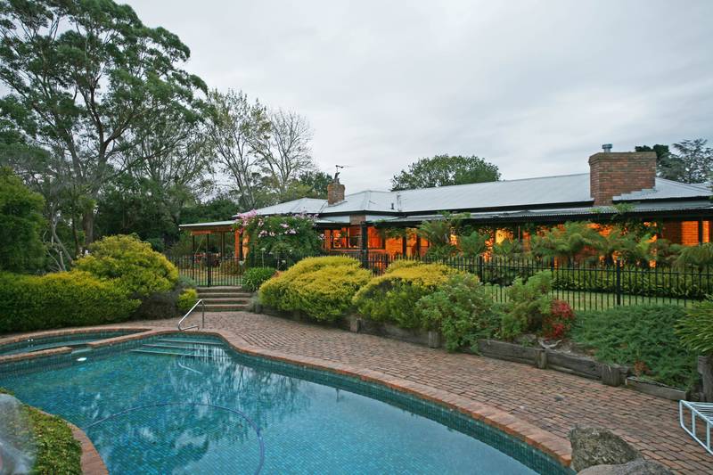 QUALITY HOMESTEAD ON 2 PARK-LIKE ACRES Picture 1