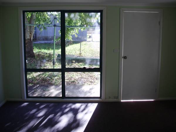 Comfy Cottage on a Beautiful Big Treed Block Picture