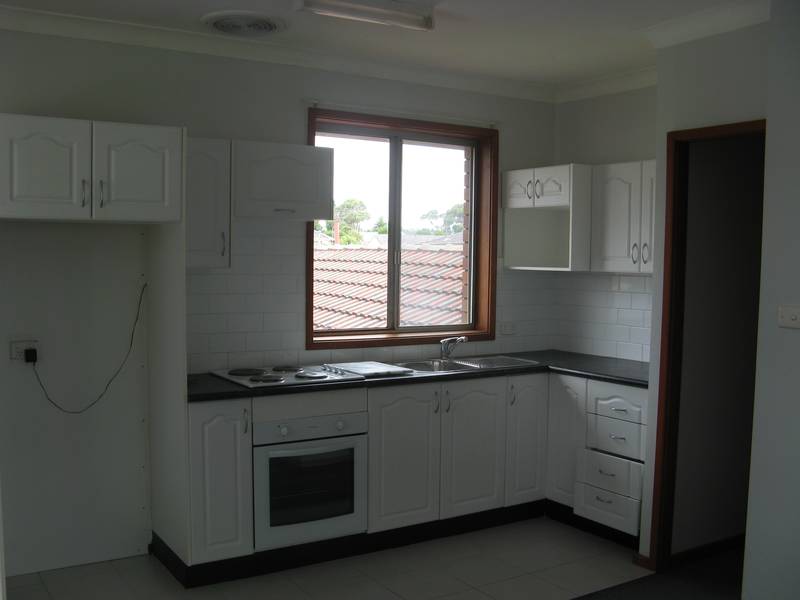 UPDATED UNIT WITH RENOVATED KITCHEN Picture 2