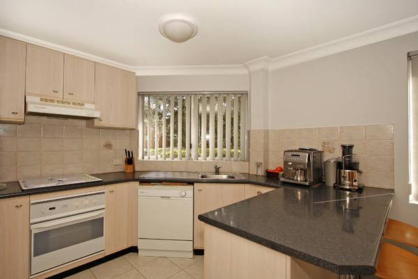 Spacious Ground Floor Unit with Huge 2 Car Garage Picture