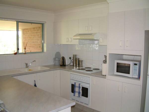 Spacious Top Floor Unit with Double Garage Picture 2