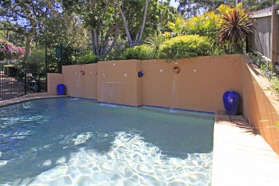 Family Home with Stunning Swimming Pool Picture