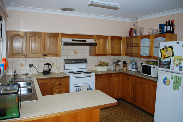 Single Level Brick Home with In-ground Swimming Pool Picture 2