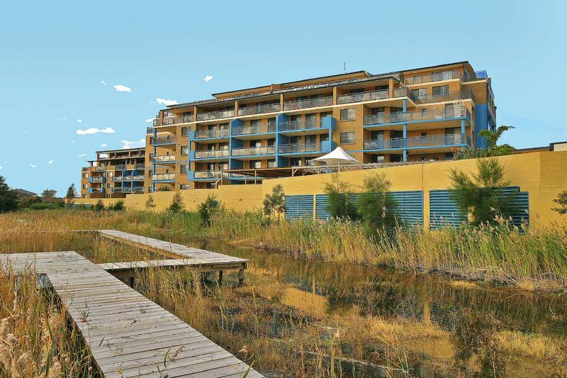 ACROSS THE ROAD FROM THE PRETTIEST SURF BEACH Picture 1