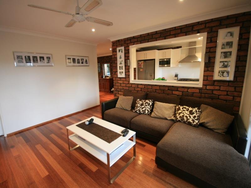 TUCKED AWAY ON OVER ONE THIRD OF AN ACRE Picture 1