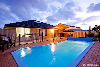 IT'S ALL HERE... EVERYTHING YOU HAVE BEEN LOOKING FOR IN A HOME...INCLUDING A SPARKLING BELOW GROUND POOL. Picture