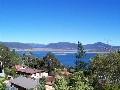 Large Vacant block with Fabulous Lake & Mountain Views Picture