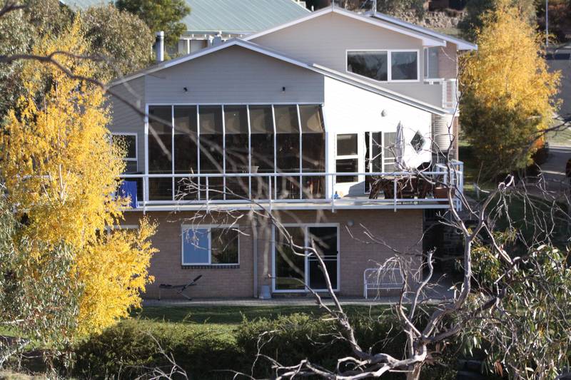 DRESS CIRCLE DUAL OCCUPANCY WITH EXPANSIVE LAKE, TOWN AND MOUNTAIN VIEWS Picture 1