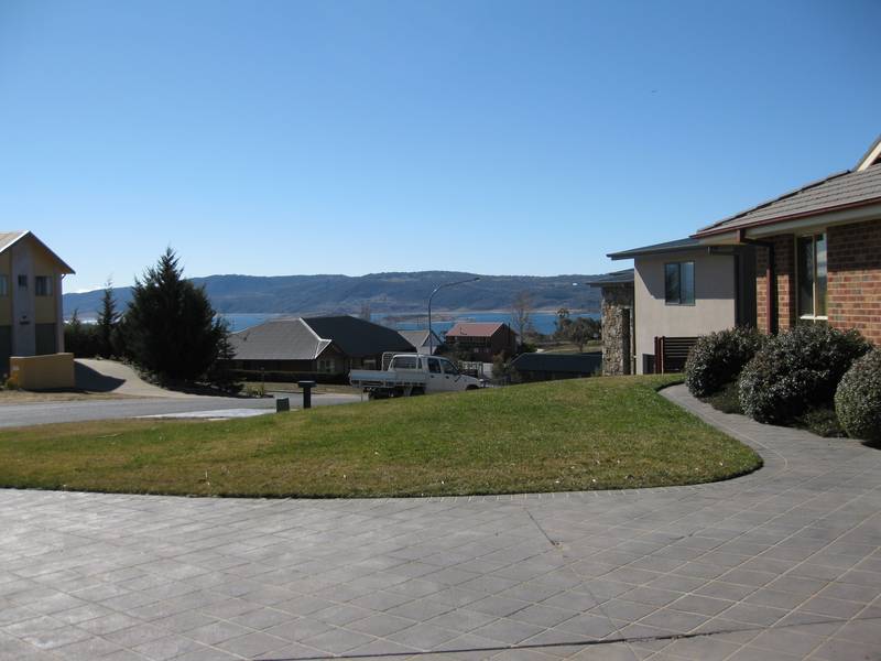 Single level Duplex with Lock up Garage & Lake Views Picture 3