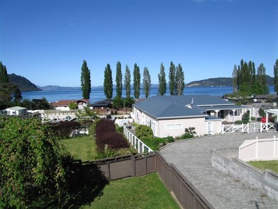 OLDER HOME WITH A SUPERB POSITION ABOVE THE MARINA - LOOKING OUT ACROSS THE BAY Picture