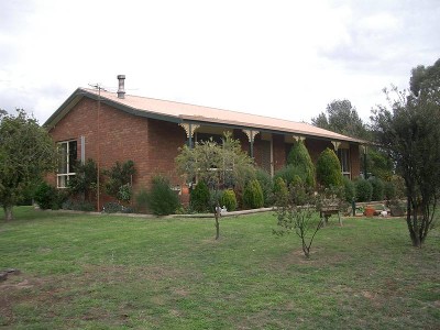 HOUSE ON TWO 10 ACRE TITLES WITH BAY VIEWS. Picture