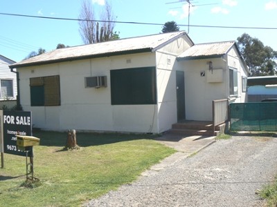 ONLY A SHORT WALK TO SHOPS AND TRANSPORT Picture