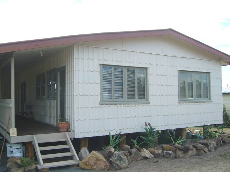 A TOUCH UNUSUAL Picture 1