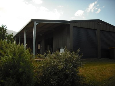 (REDUCED) APPROX 1 ACRE + SHED INCLUDES KITCHEN AND BATHROOM Picture