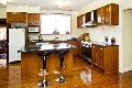 QUALITY KITCHEN, POLISHED FLOORS.. COME TAKE A LOOK ON THE INSIDE! Picture