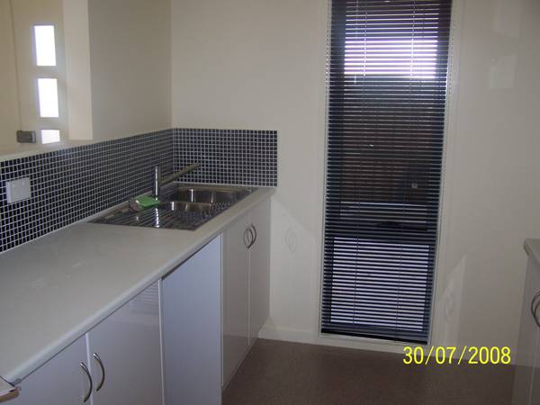 AS NEW TWO BEDROOM PLUS STUDY TOWNHOUSE Picture