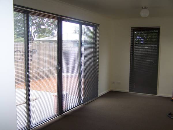 AS NEW TWO BEDROOM PLUS STUDY TOWNHOUSE Picture