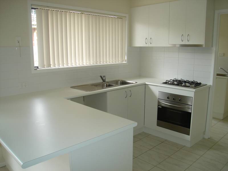 NEAR NEW TWO BEDROOM TOWNHOUSE Picture 2