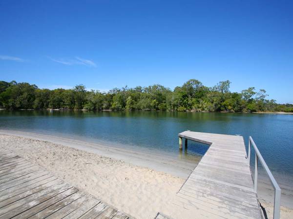 Riverfront Home with Private Sandy Beach and Jetty Picture 1