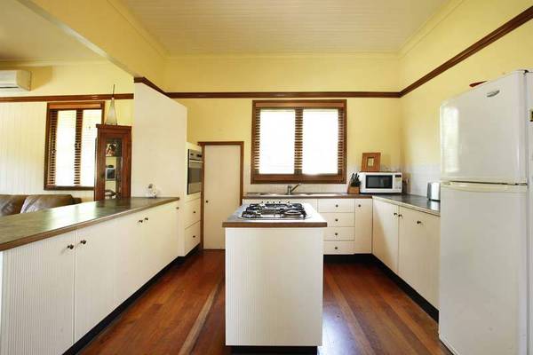 GORGEOUS CHARACTER FILLED HOME - LEGAL HEIGHT UNDERNEATH Picture 3