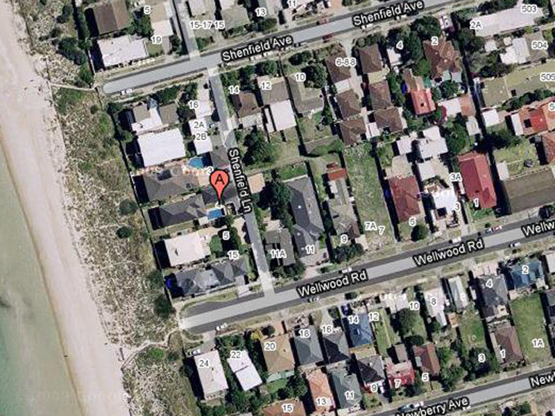 Absolute Beachfront Family Home Picture 1