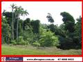 PRIVACY IN A RAINFOREST SETTING WITH AN ATTRACTIVE PRICE TAG! Picture