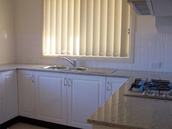 IN A SMALL COMPLEX OF 6 - STROLL TO TOWN Picture 3