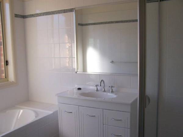 IN A SMALL COMPLEX OF 6 - STROLL TO TOWN Picture 2