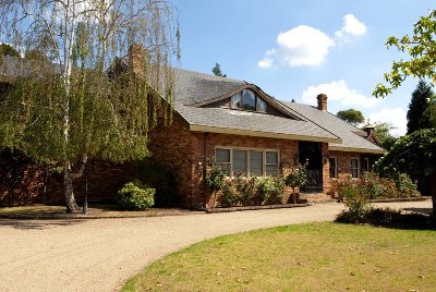 QUIET LUXURY - RICH IN TRADITION - BRILLIANT 1 ACRE GARDEN SETTING Picture