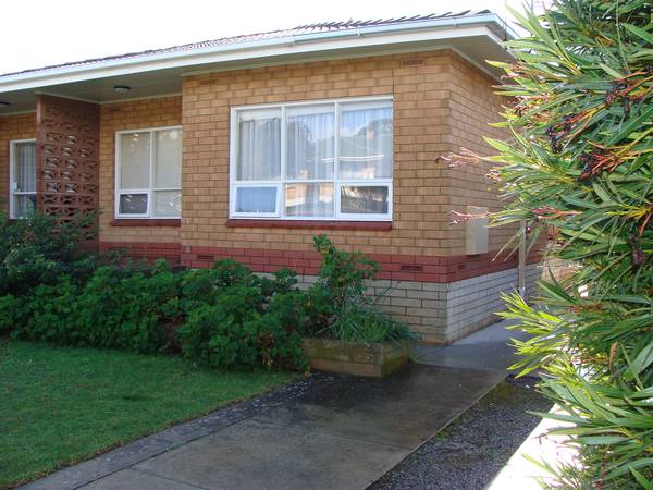 Solid Brick Unit with Tiled Roof & Carport Picture