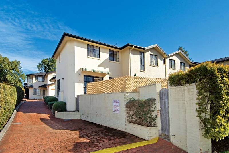 NO CAR REQUIRED . . . Walk to Shops, Buses and More . . . Picture 1