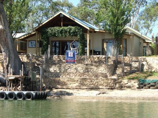 Stylish Riverfront Living Picture 1