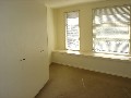 Superb studio apartment above garages suitable for professional home office. Picture