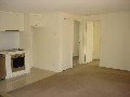 Superb studio apartment above garages suitable for professional home office. Picture