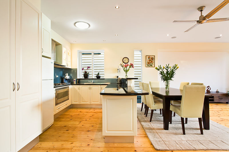 Live a contemporary life in this oversized Victorian. Picture