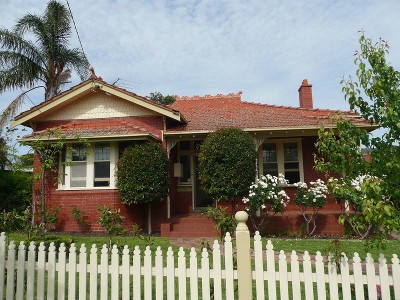 UNDER APPLICATION-A gracious and charming home with beautifully maintained gardens. Picture