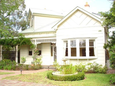 Spacious architectual designed double storey family home beautifully renovated and presented. Picture