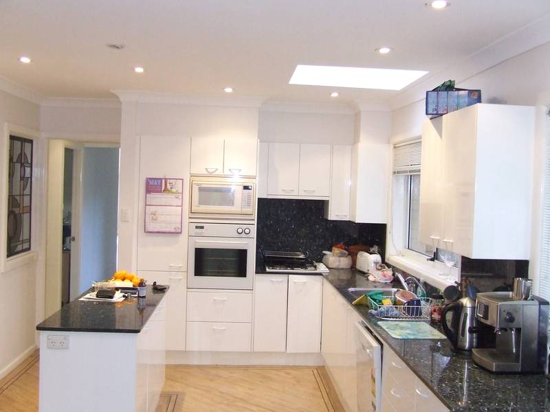 ***LEASED***. . .Renovated family living... Walk to village & shops Picture