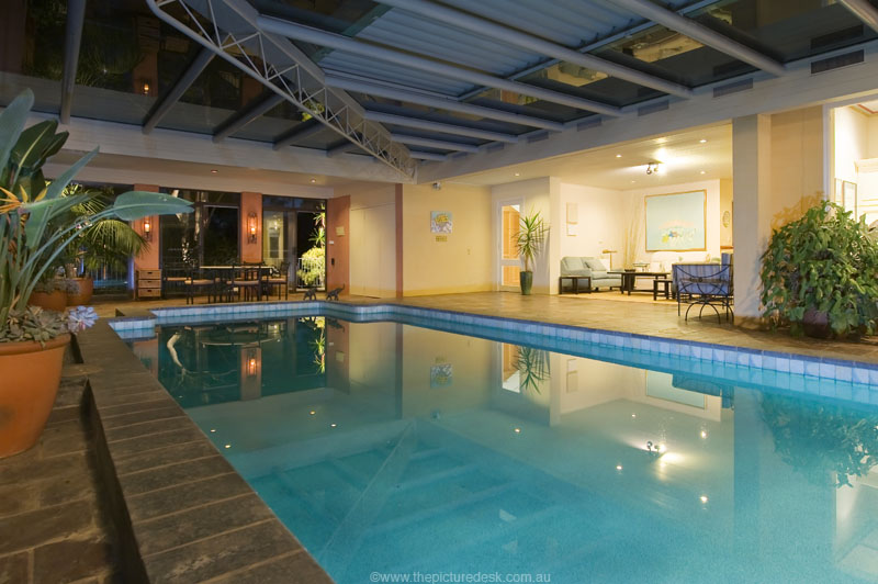 GRAND EAST-SIDE RESIDENCE WITH COURT AND INDOOR POOL! Picture 2